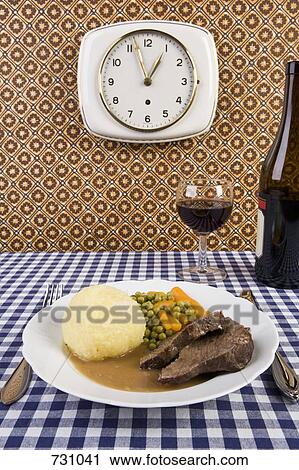 A plate of food with a glass and bottle of wine View Large Photo Image Stock Image - A plate of food with a glass and bottle of wine. Fotosearch