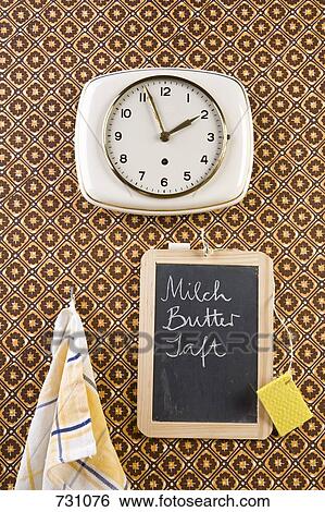 A wall clock, dish towel and chalkboard, still life View Large Photo Image Stock Photograph - A wall clock, dish towel and chalkboard, still life. Fotosearch