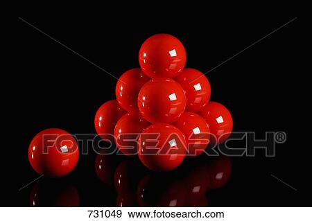 Snooker balls arranged in a pyramid shape with one aside View Large Photo Image Stock Photo - Snooker balls arranged in a pyramid shape with one aside. Fotosearch