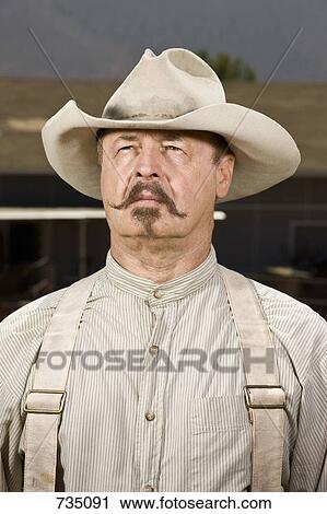 Portrait of a cowboy View Large Photo Image Stock Image - Portrait of a cowboy. Fotosearch