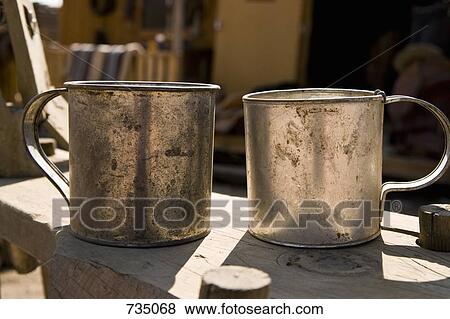 Two metal mugs View Large Photo Image Stock Photo - Two metal mugs. Fotosearch