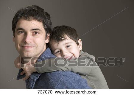 Portrait of a son and father View Large Photo Image Stock Image - Portrait of a son and father. Fotosearch