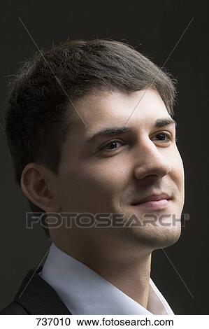 Portrait of a young man View Large Photo Image Stock Image - Portrait of a young man. Fotosearch