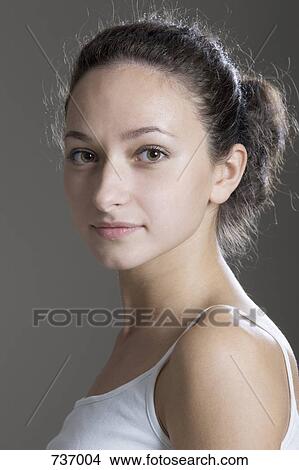 Portrait of a young woman View Large Photo Image Picture - Portrait of a young woman. Fotosearch