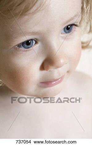Studio Portrait of a young boy View Large Photo Image Picture - Studio Portrait of a young boy. Fotosearch