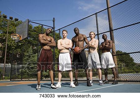 Five basketball players in a row, portrait View Large Photo Image Stock Image - Five basketball players in a row, portrait. Fotosearch