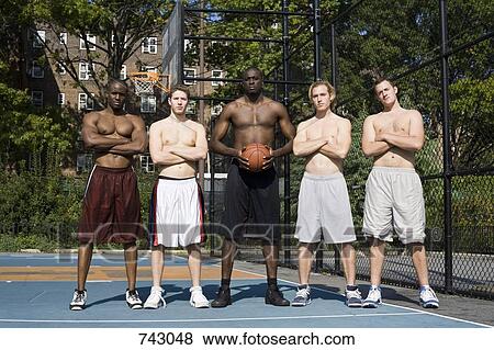 Stock Photo - Five basketball players, in a row. Fotosearch