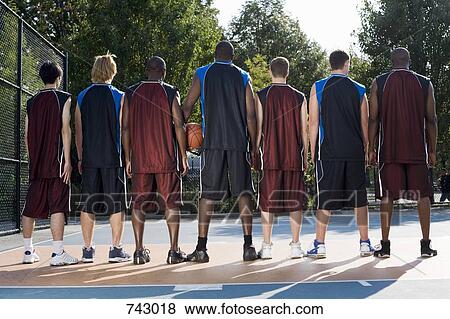 Seven basketball players in a row View Large Photo Image Stock Photo - Seven basketball players in a row. Fotosearch