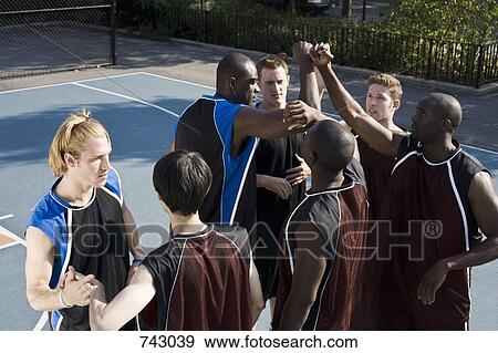 Two teams of basketball players shaking hands View Large Photo Image Stock Photo - Two teams of basketball players shaking hands. Fotosearch