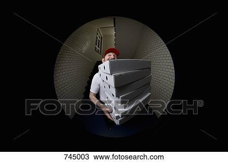 A pizza delivery man, portrait View Large Photo Image Stock Image - A pizza delivery man, portrait. Fotosearch