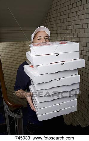 A pizza delivery man, portrait View Large Photo Image Stock Image - A pizza delivery man, portrait. Fotosearch