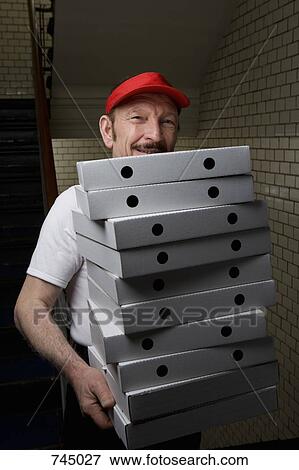 A pizza delivery man, portrait View Large Photo Image Stock Photo - A pizza delivery man, portrait. Fotosearch