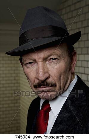An organized crime boss, portrait View Large Photo Image Picture - An organized crime boss, portrait. Fotosearch