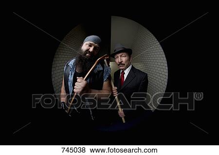 Stock Photo - An organized crime boss with his bodyguard, viewed through a peephole. Fotosearch
