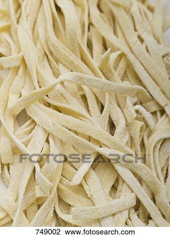 Fresh fettuccine pasta View Large Photo Image Stock Image - Fresh fettuccine pasta. Fotosearch