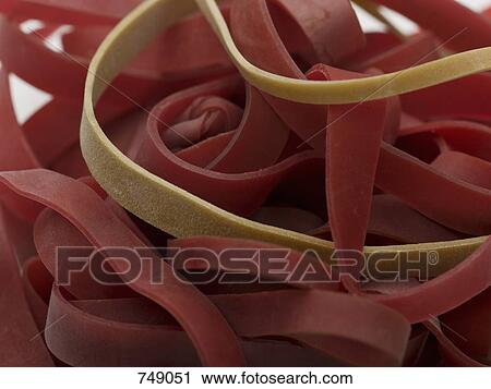 Stock Image - Fresh red fettuccine pasta. Fotosearch
