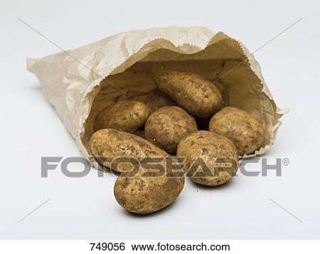 Potatoes in a paper bag View Large Photo Image Stock Photograph - Potatoes in a paper bag. Fotosearch