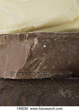 Stack of dark, milk and white chocolate View Large Photo Image Stock Photography - Stack of dark, milk and white chocolate. Fotosearch