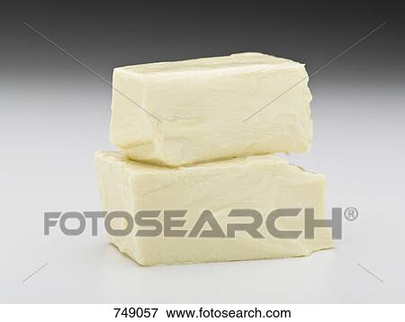 Two pieces of white chocolate View Large Photo Image Stock Photo - Two pieces of white chocolate. Fotosearch