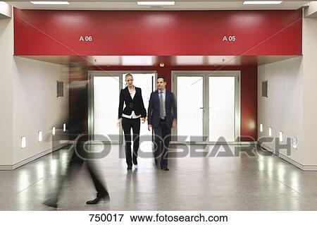 Business people walking in different directions View Large Photo Image Stock Photo - Business people walking in different directions. Fotosearch