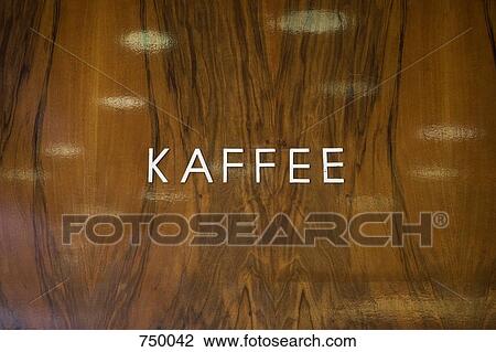 Stock Image - Kaffee sign on a wall. Fotosearch