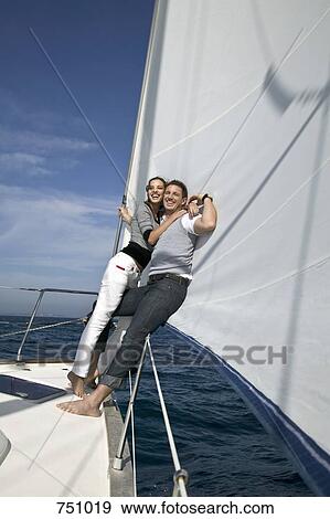 A couple embracing on a yacht View Large Photo Image Stock Photo - A couple embracing on a yacht. Fotosearch