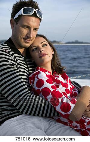 A couple embracing View Large Photo Image Stock Photograph - A couple embracing. Fotosearch