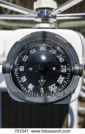 Detail of the compass on a yacht View Large Photo Image Stock Image - Detail of the compass on a yacht. Fotosearch