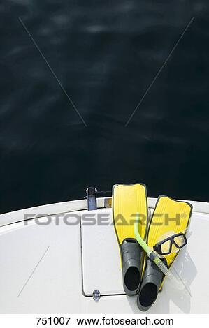 Snorkel mask and flippers on a yacht View Large Photo Image Stock Photo - Snorkel mask and flippers on a yacht. Fotosearch