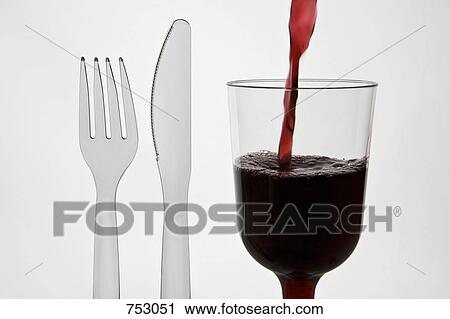 A plastic knife and fork and a glass of red wine View Large Photo Image Stock Image - A plastic knife and fork and a glass of red wine. Fotosearch