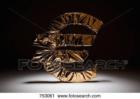 Euro sign wrapped in gold View Large Photo Image Stock Image - Euro sign wrapped in gold. Fotosearch