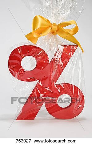 Percentage sign wrapped in plastic and tied with a bow View Large Photo Image Stock Photo - Percentage sign wrapped in plastic and tied with a bow. Fotosearch