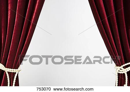 Red velvet curtains tied with gold rope View Large Photo Image Stock Image - Red velvet curtains tied with gold rope. Fotosearch