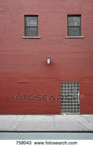 A brick building painted red View Large Photo Image Stock Image - A brick building painted red. Fotosearch