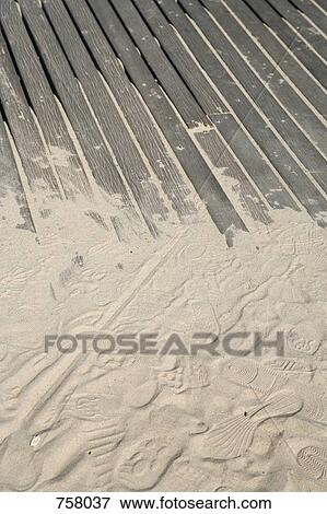 Sand covering wooden decking View Large Photo Image Stock Photo - Sand covering wooden decking. Fotosearch