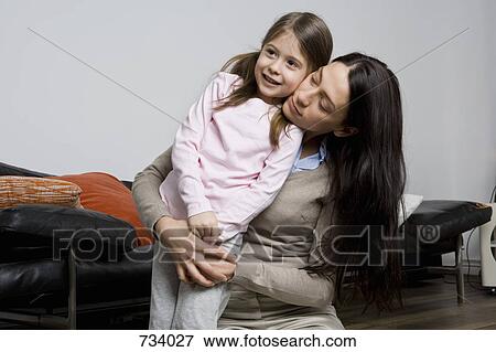 Stock Photo - A mother and daughter. Fotosearch
