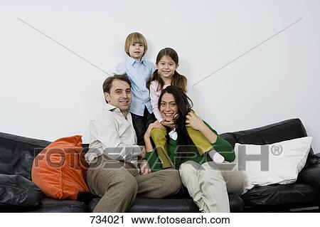 Stock Image - Portrait of a family of four. Fotosearch