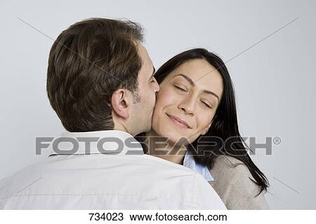 Portrait of a man and woman being affectionate View Large Photo Image Stock Image - Portrait of a man and woman being affectionate. Fotosearch