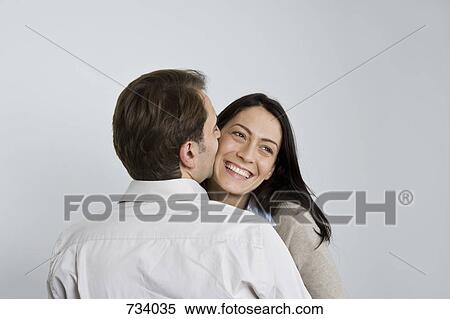 Portrait of a man and woman being affectionate View Large Photo Image Stock Photography - Portrait of a man and woman being affectionate. Fotosearch