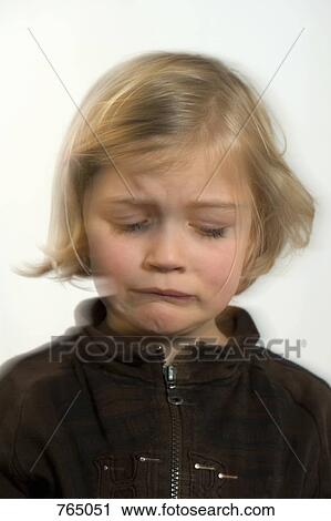 Stock Image - A little girl crying. Fotosearch