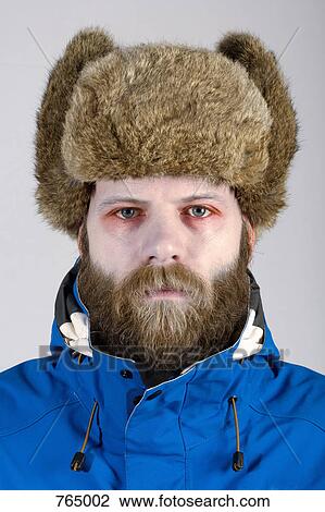 A man wearing warm clothes and has pale skin and red eyes View Large Photo Image Stock Image - A man wearing warm clothes and has pale skin and red eyes. Fotosearch