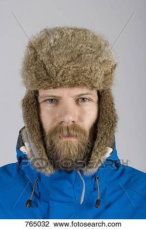 Stock Image - A man wearing warm clothing. Fotosearch