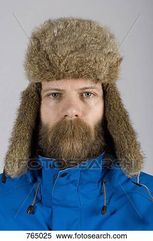 A man wearing warm clothing with long mustache hair covering his mouth View Large Photo Image Stock Photography - A man wearing warm clothing with long mustache hair covering his mouth. Fotosearch