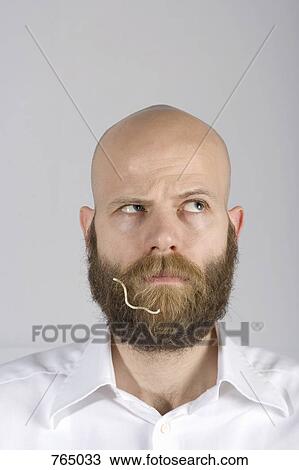 A man with a noodle in his beard View Large Photo Image Stock Image - A man with a noodle in his beard. Fotosearch