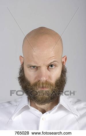 A man with his eyebrow raised View Large Photo Image Stock Photo - A man with his eyebrow raised. Fotosearch