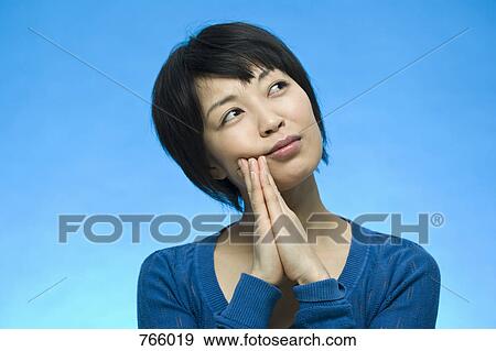 Portrait of a woman contemplating View Large Photo Image Stock Photo - Portrait of a woman contemplating. Fotosearch