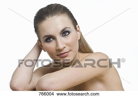 Picture - Portrait of young woman leaning on elbows. Fotosearch