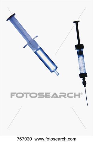 Stock Image - Two syringes. Fotosearch