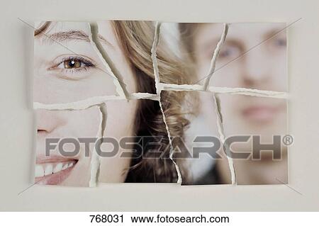 A photograph of a heterosexual couple torn into pieces View Large Photo Image Stock Image - A photograph of a heterosexual couple torn into pieces. Fotosearch