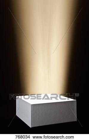 Picture - A spot lit pedestal. Fotosearch